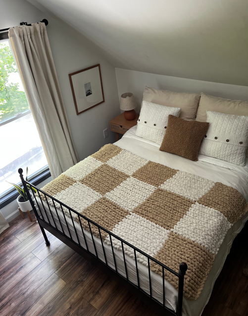 CHECKERED BROWN AND WHITE BLANKET