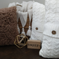 Beautiful Contrast in colors and textures ... -  1 Fuzzy Throw Pillow -  2 Ivory Button Knit Throw Pillows 