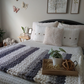 Cream Fuzzy Throw Pillow with chunky throw blanket